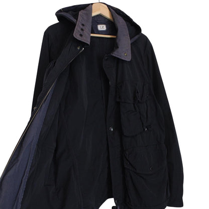 CP Company navy blue nylon jacket with multi pockets and garment dyed finish.