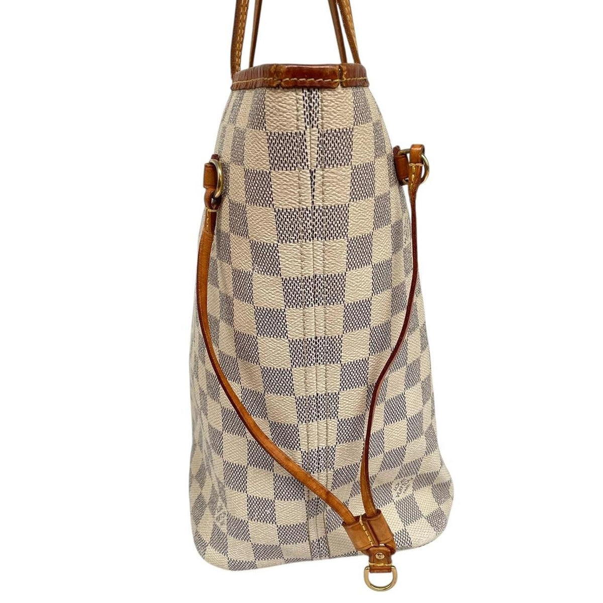 Louis Vuitton cream Damier Azur tote bag with leather trim and logo pattern.