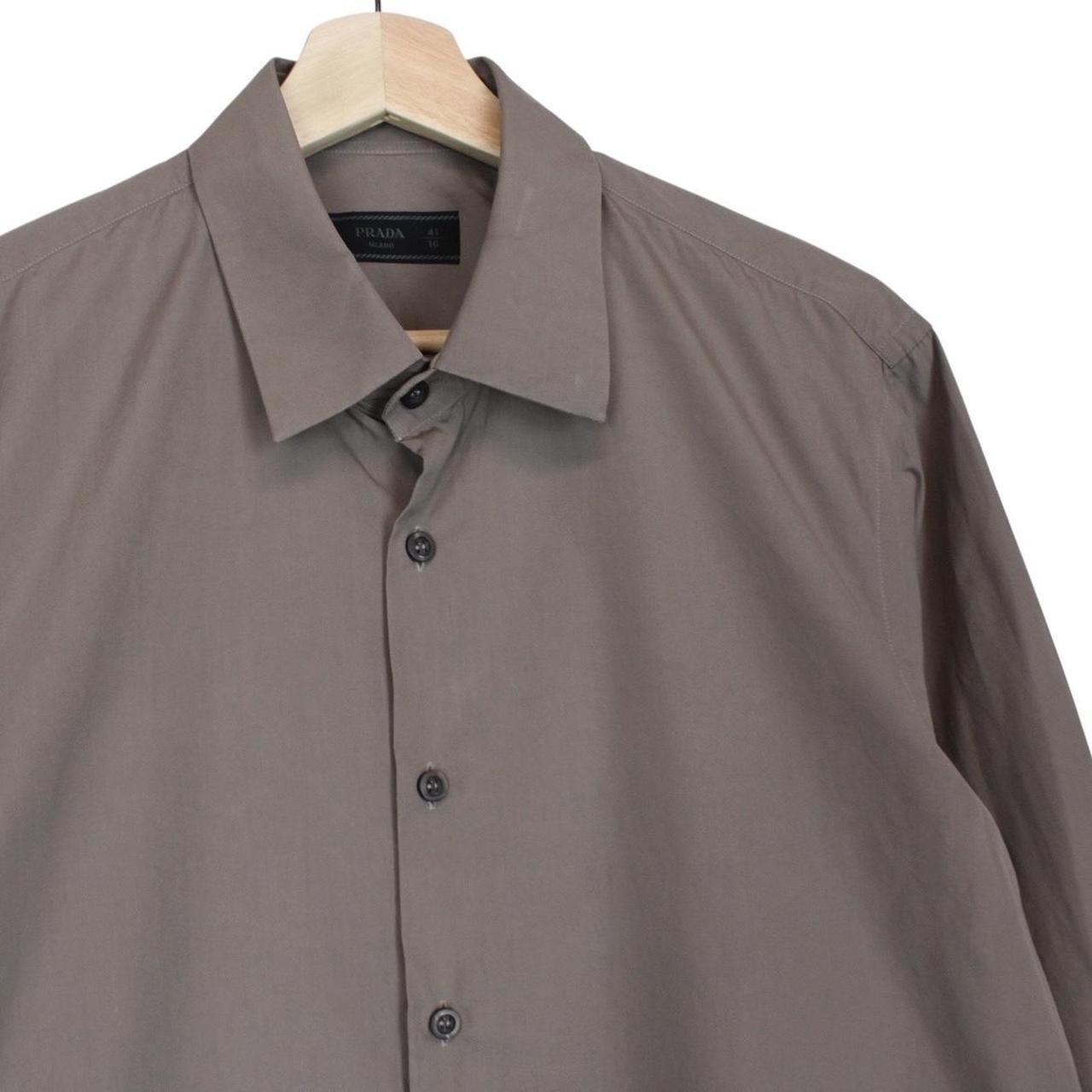 Prada brown long sleeve shirt with popeline stretch fabric and logo detail.