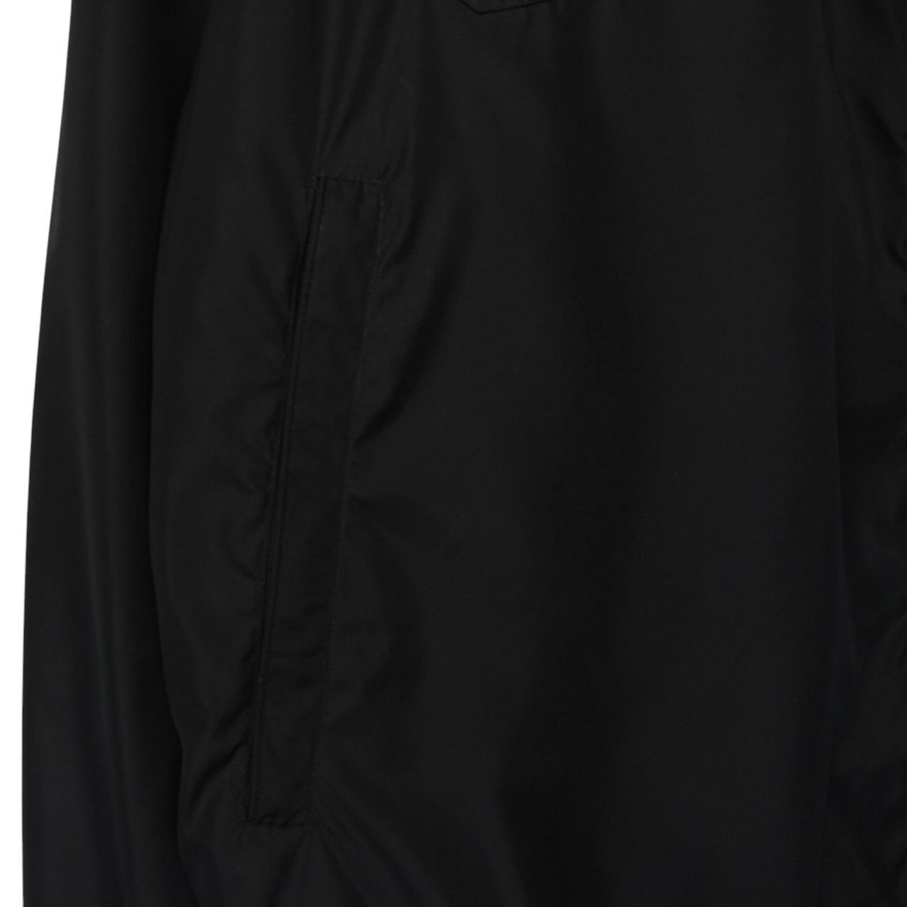 Moncler black windbreaker jacket full zip nylon with logo detail and excellent condition.