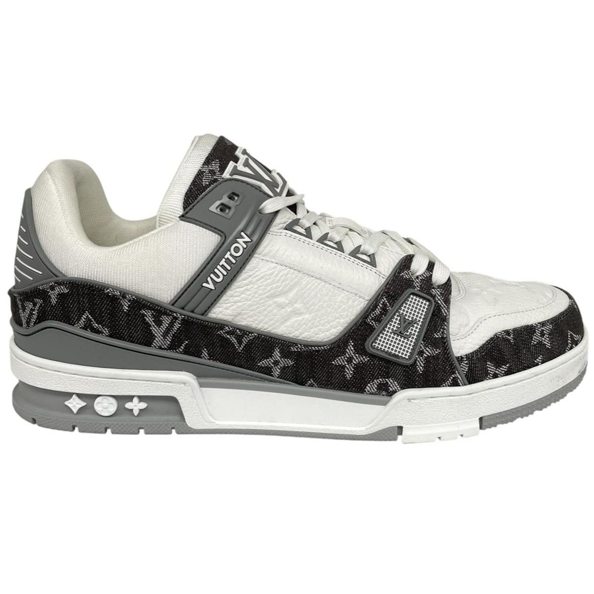 Louis Vuitton grey and white trainers with monogram pattern and leather accents.