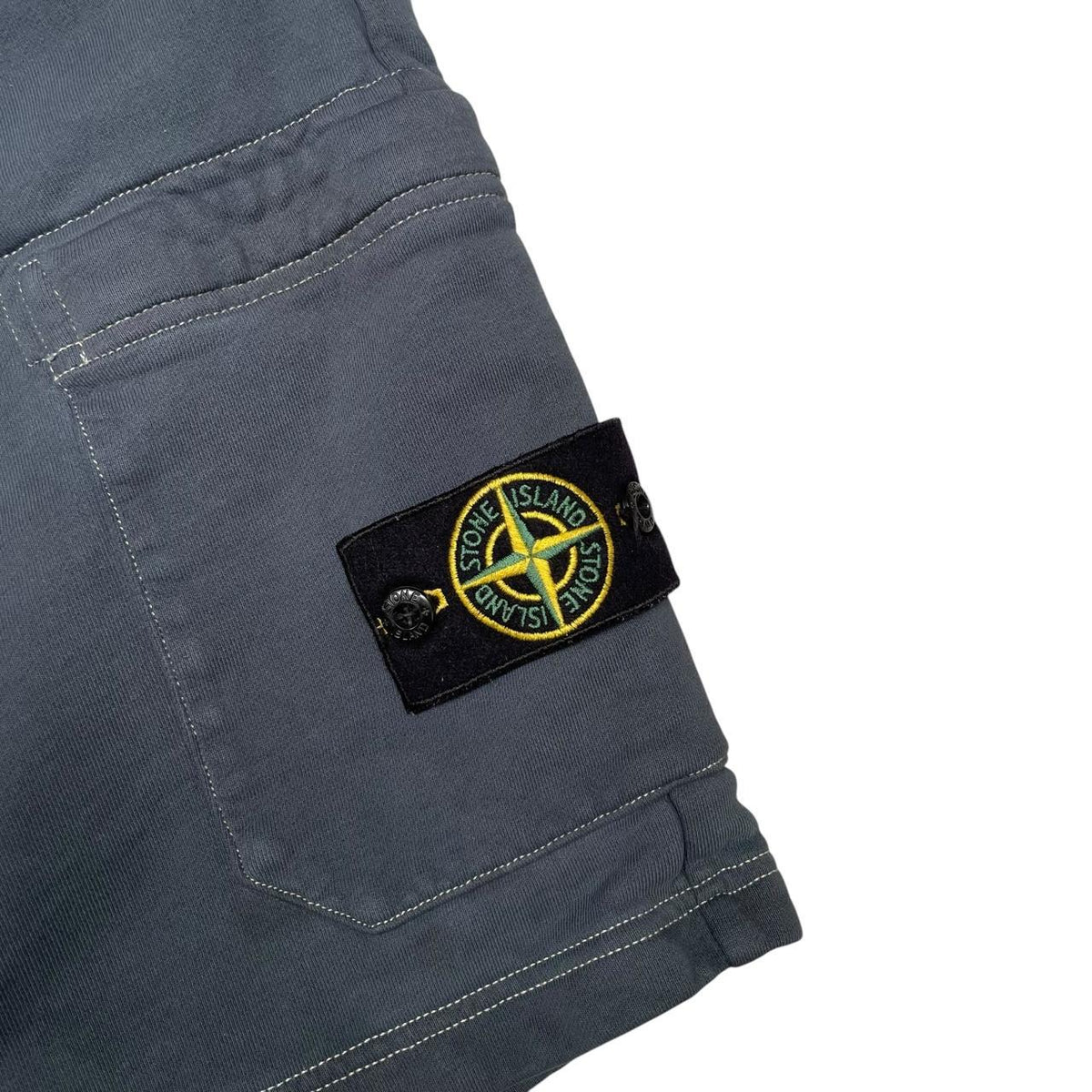 Stone Island khaki brown jogger shorts cotton material with logo patch on pocket.