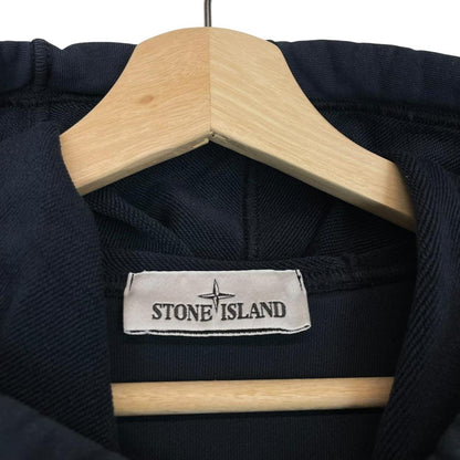 Stone Island navy blue cotton hoodie with iconic compass logo on sleeve.
