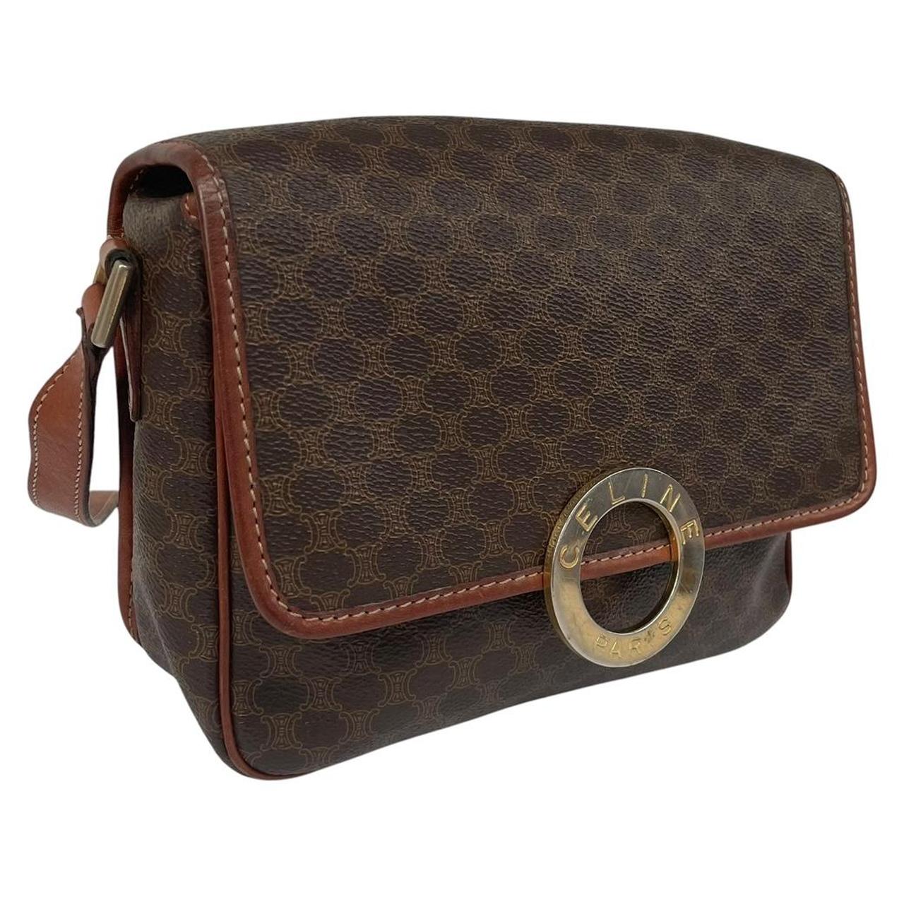 CELINE brown duffel bag with Macadam canvas pattern and logo detail.
