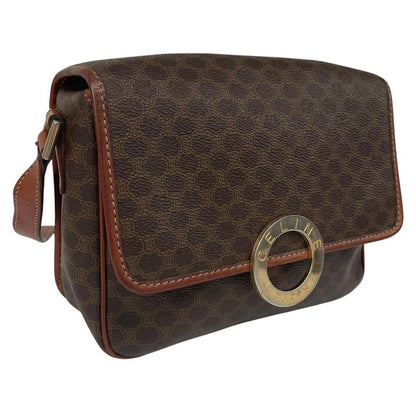 CELINE brown duffel bag with Macadam canvas pattern and logo detail.