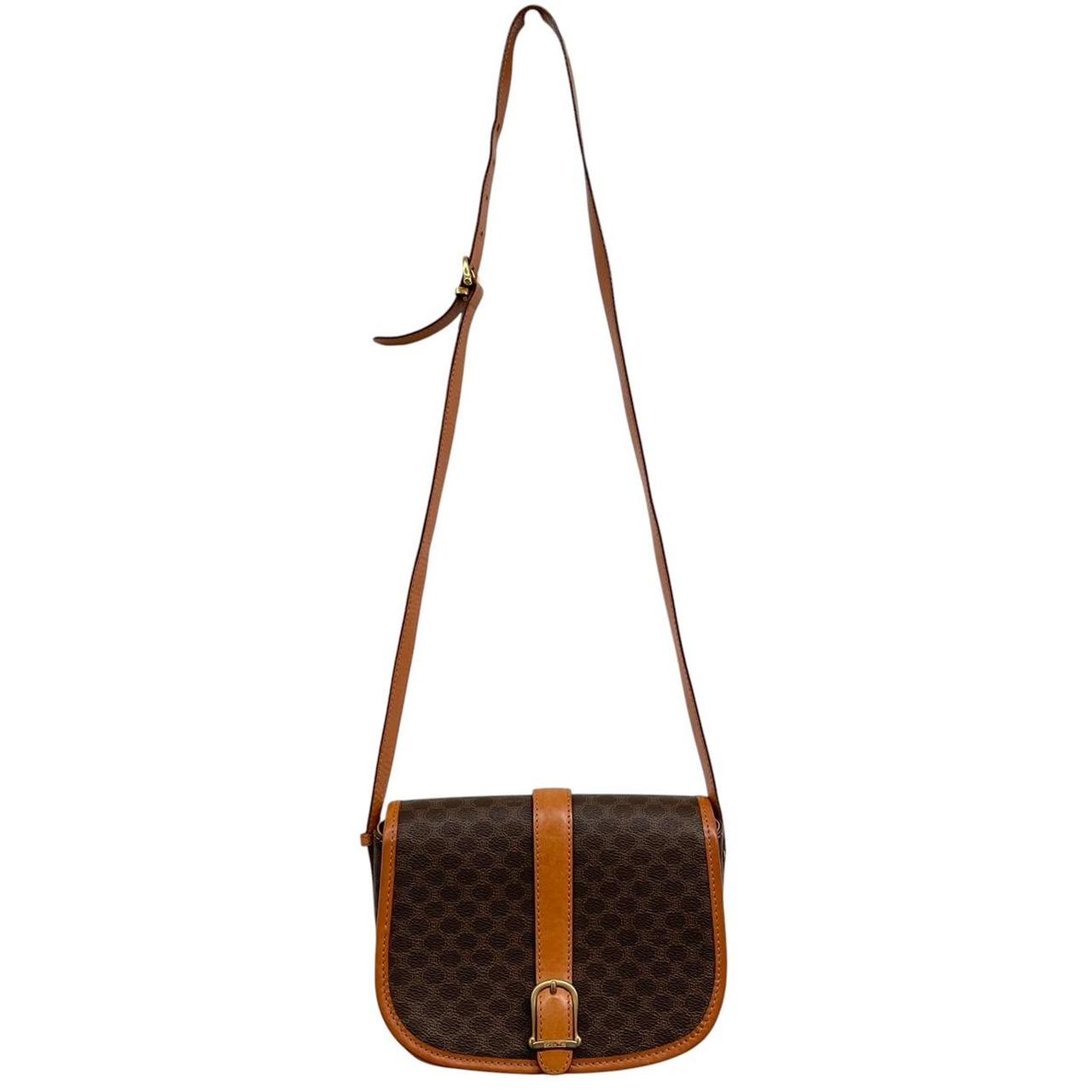 CELINE brown and tan duffel bag with Macadam pattern and leather/canvas material.
