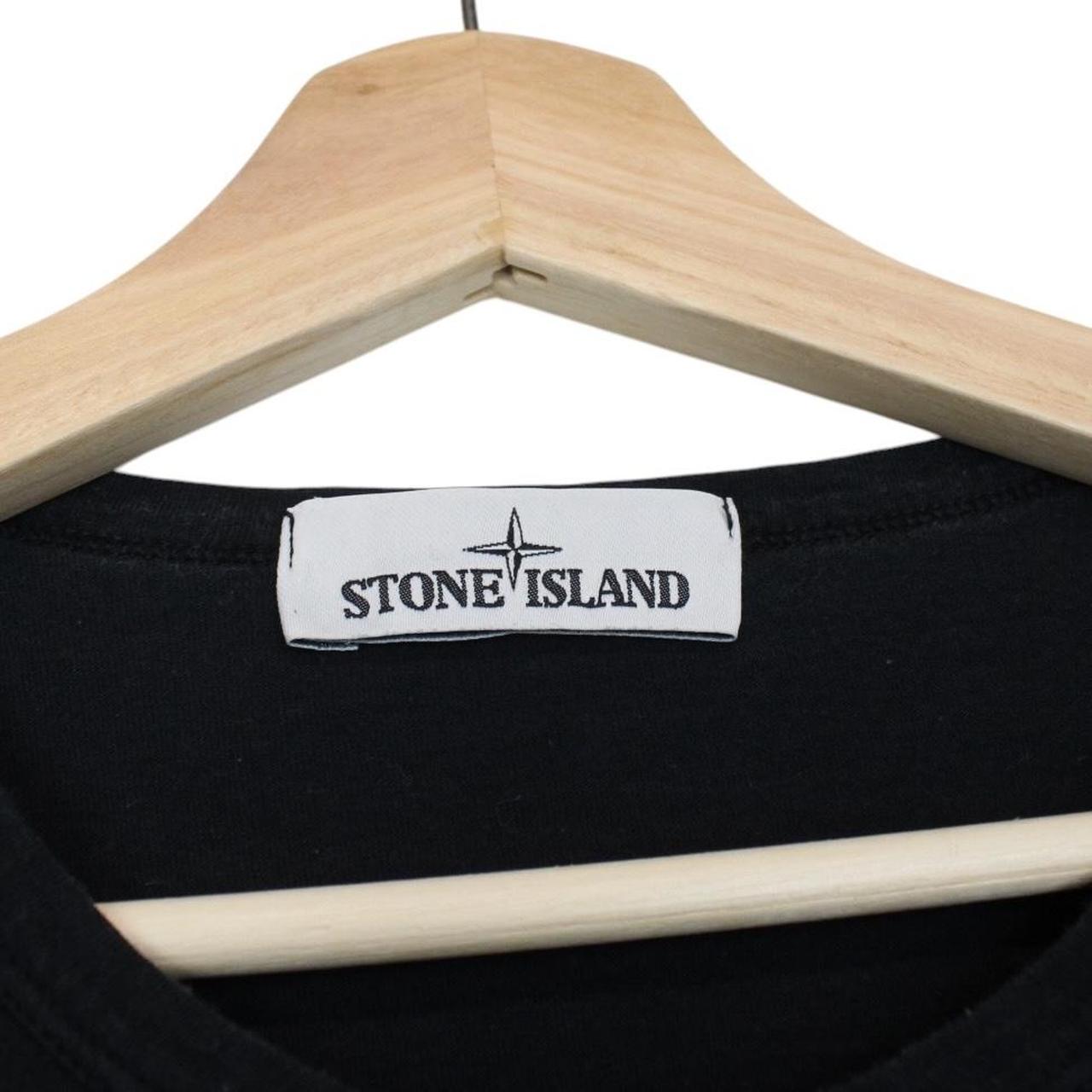 Stone Island black long sleeve t-shirt with compass logo and pocket detail.