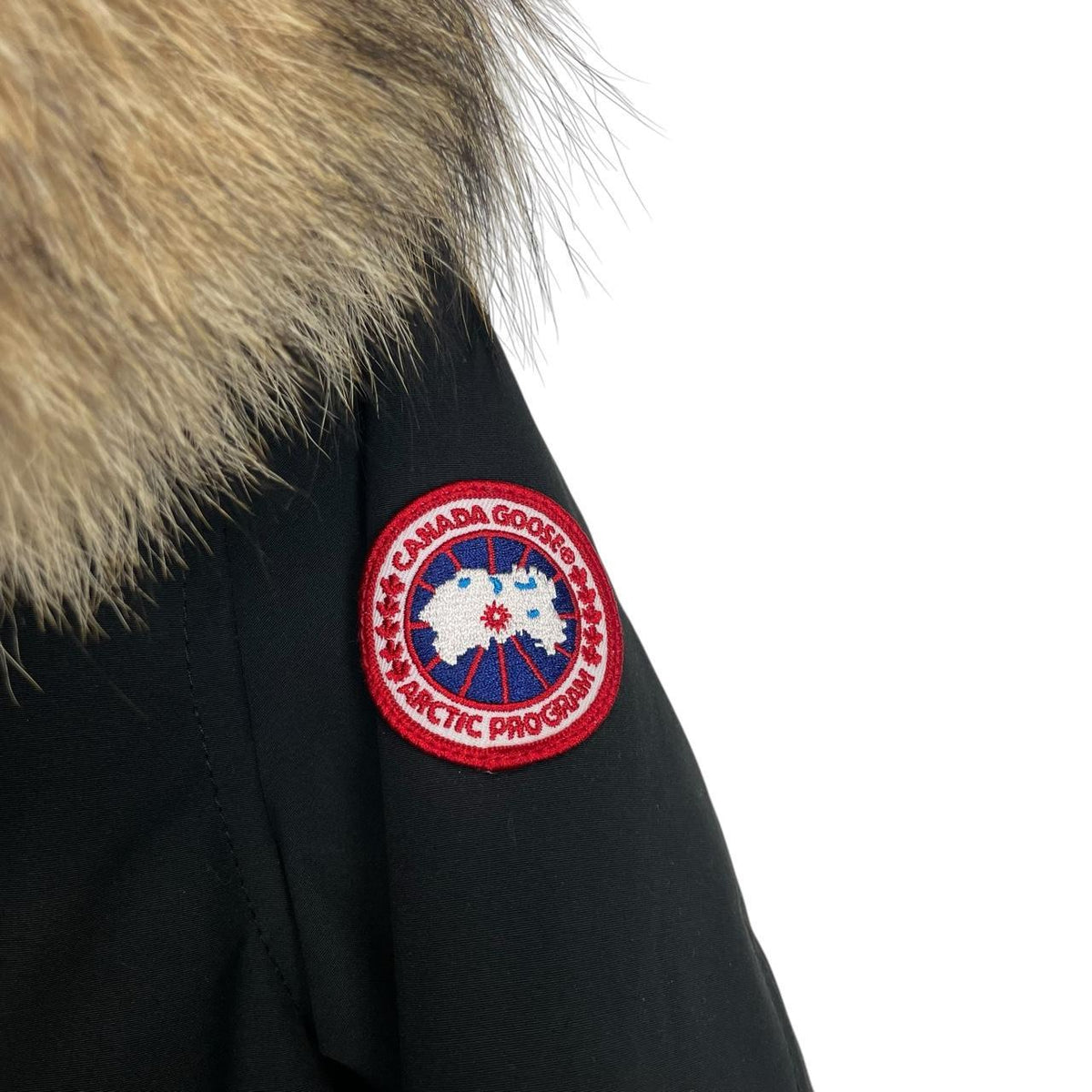 Canada Goose black parka coat with fur trim and logo patch, brand new with tags.