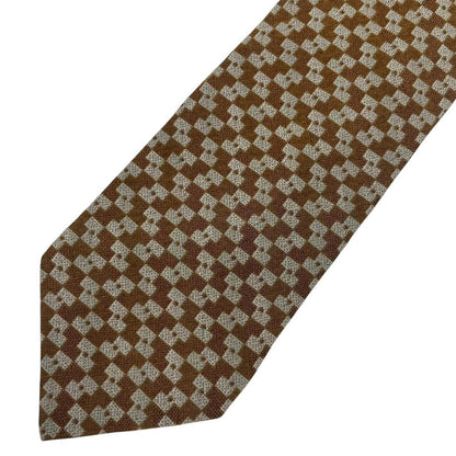 Giorgio Armani beige and brown tie with silk blend, featuring subtle pattern and excellent condition.