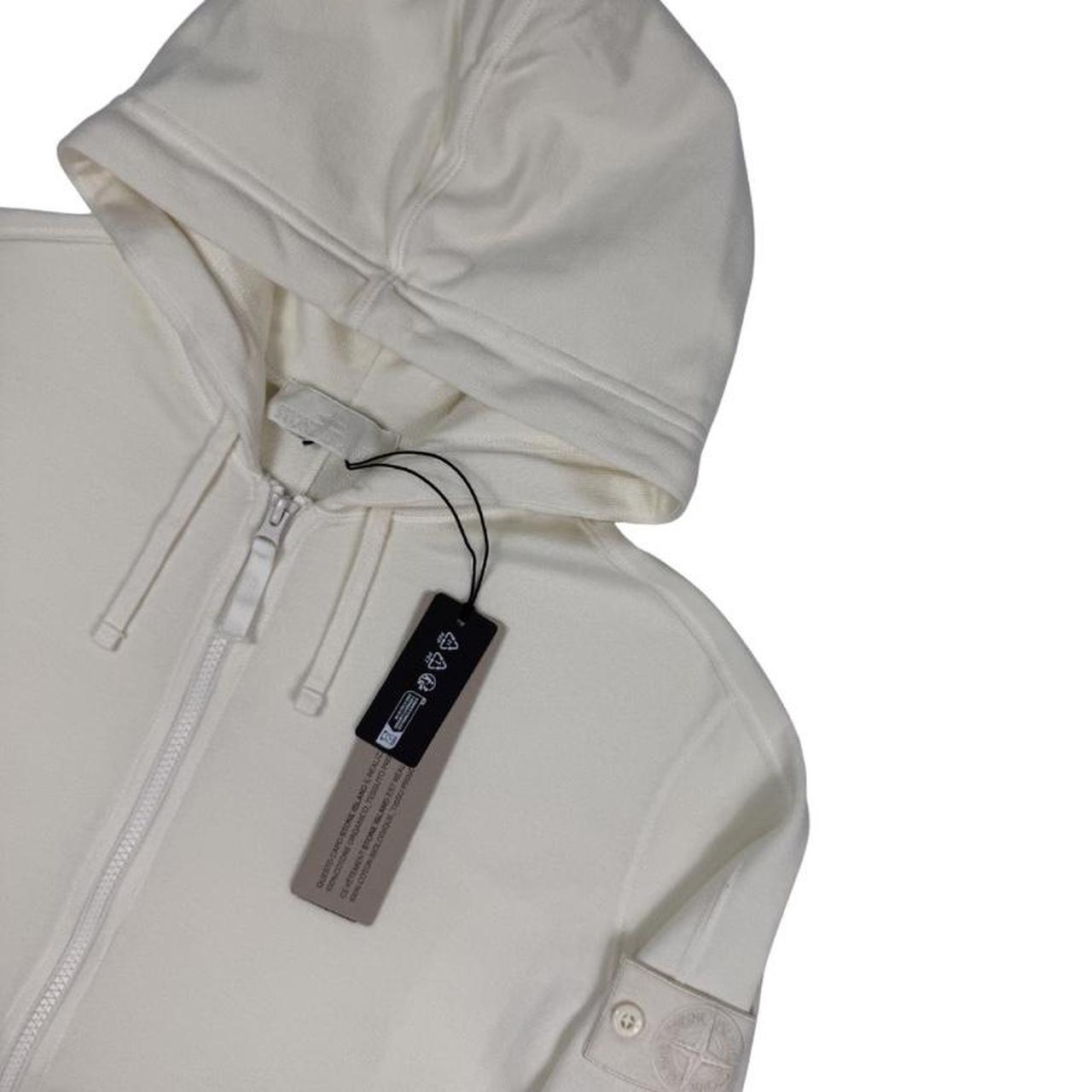 Stone Island cream full zip hoodie with ghost logo and cotton material.