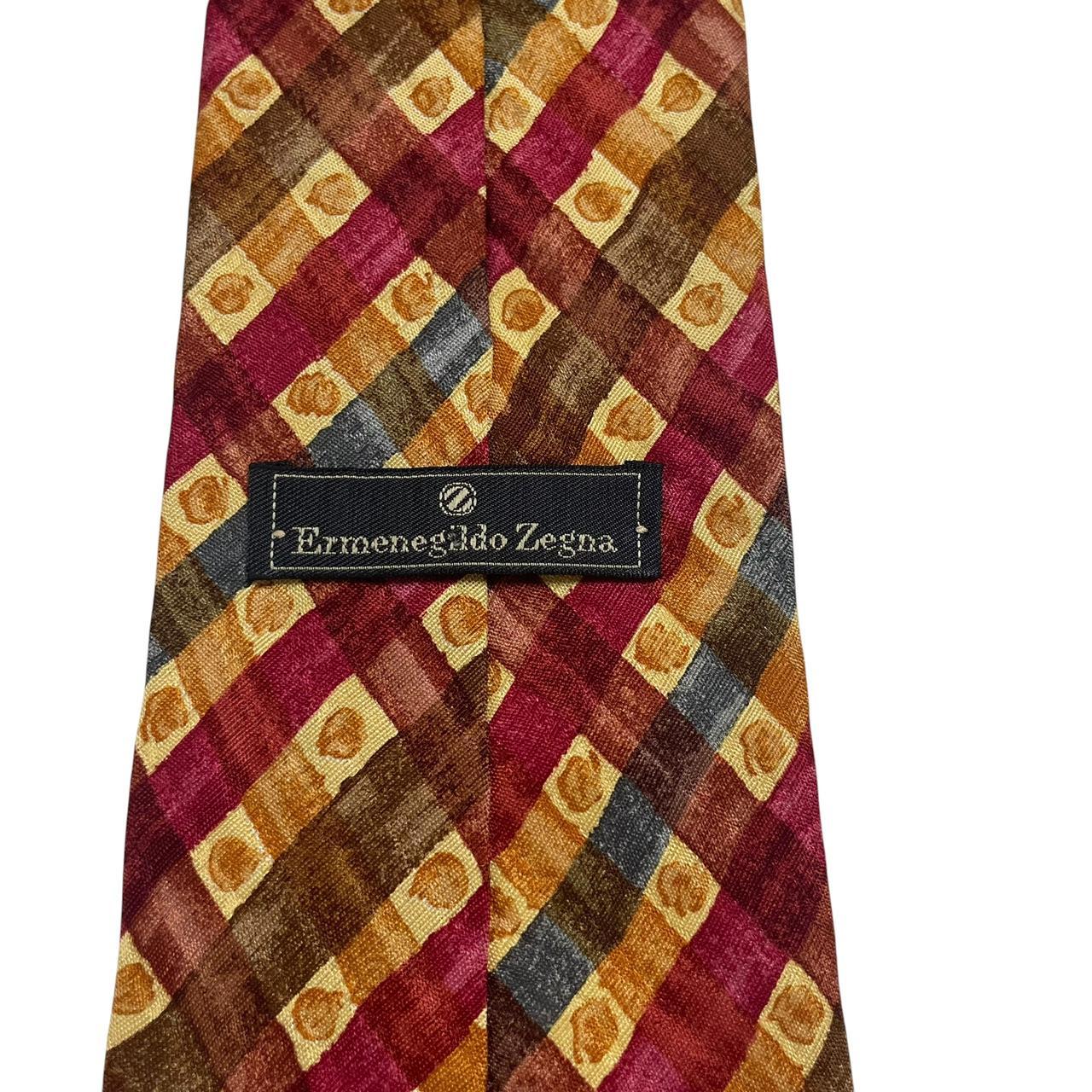 Ermenegildo Zegna multicoloured silk tie with intricate patterns and smooth texture.