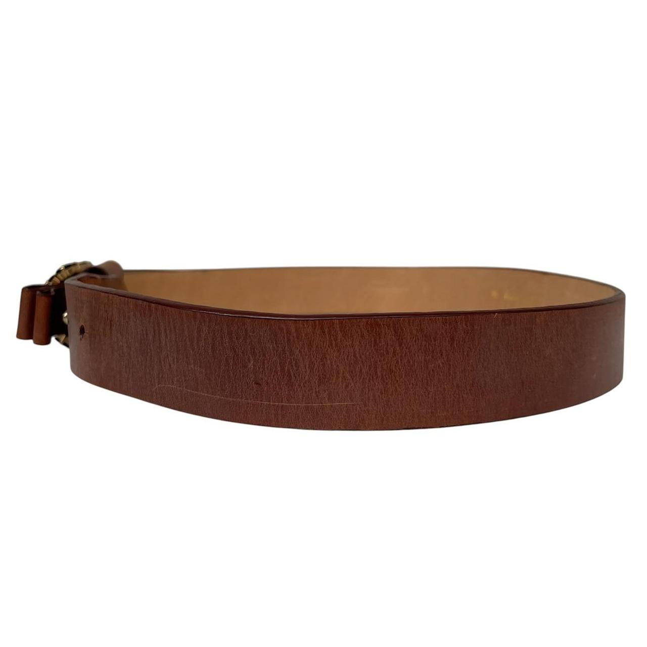 Paul Smith brown leather belt with jewelled buckle and logo detail.