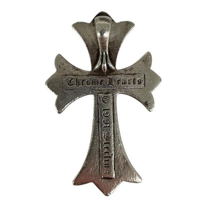 Chrome Hearts silver cross pendant with tarnished finish and vintage 1991 design.