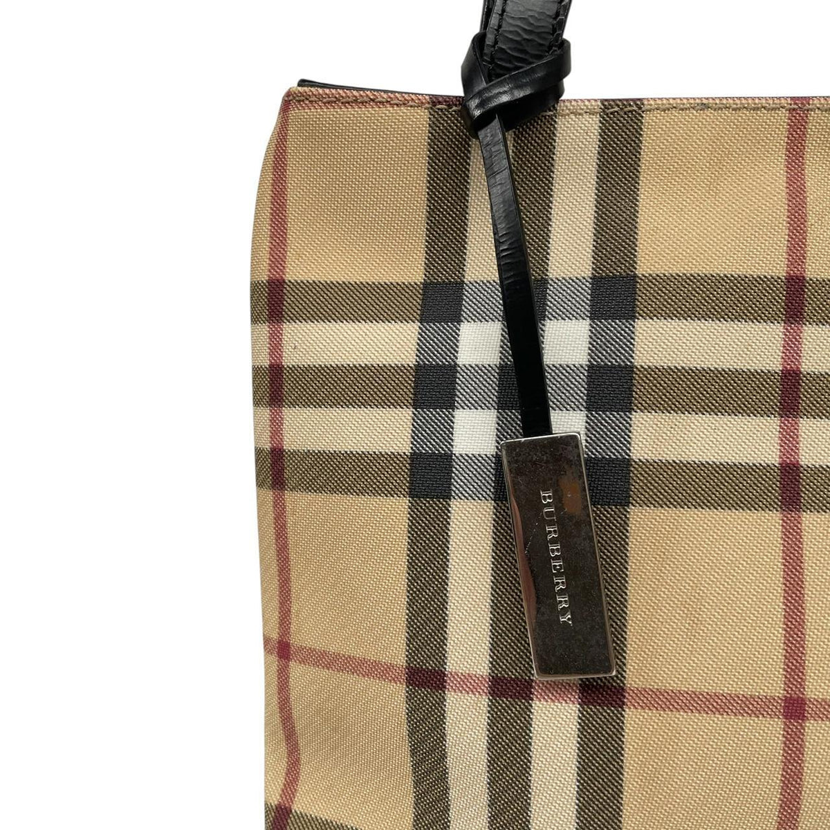Burberry beige mini tote bag with Nova Check pattern and leather accents.