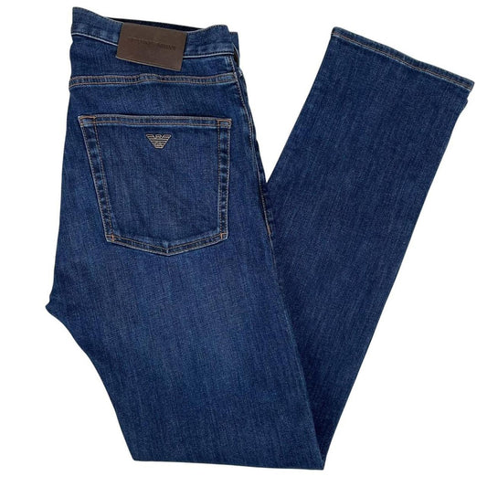 Emporio Armani navy blue slim fit denim jeans with logo patch and classic five-pocket design.
