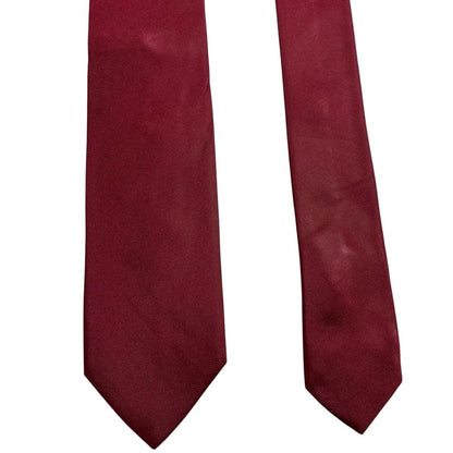Hugo Boss burgundy silk tie with smooth texture and subtle sheen.