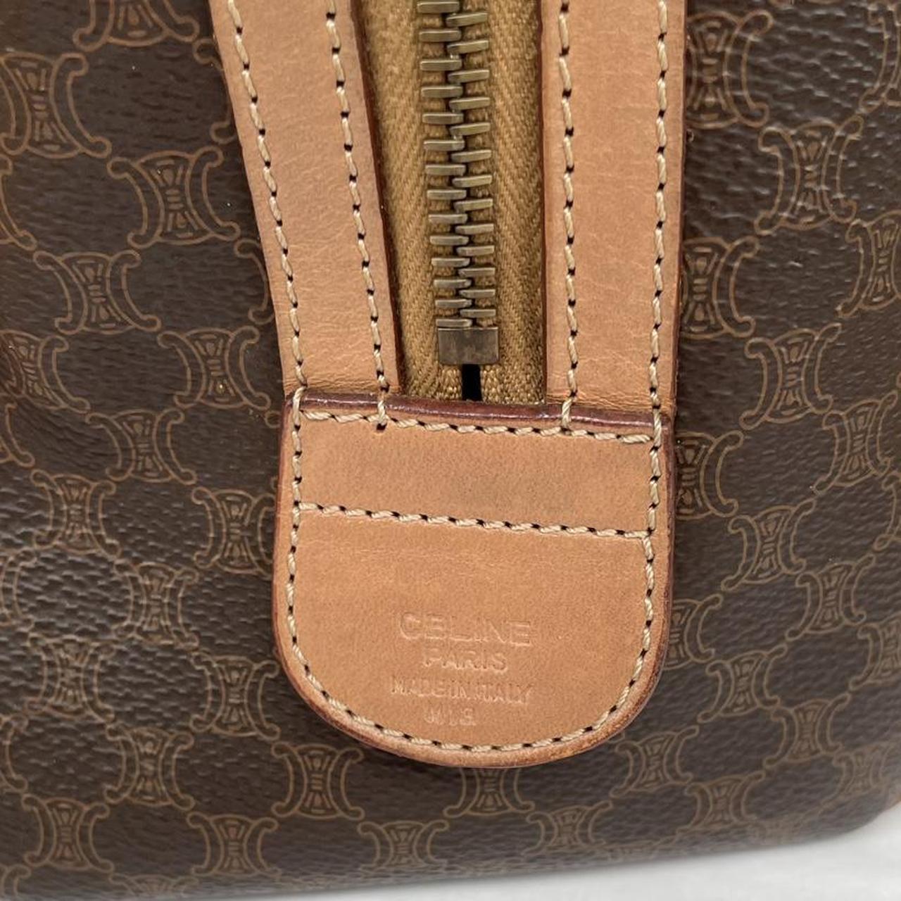 CELINE duffel bag brown and tan Macadam pattern with logo and visible wear.