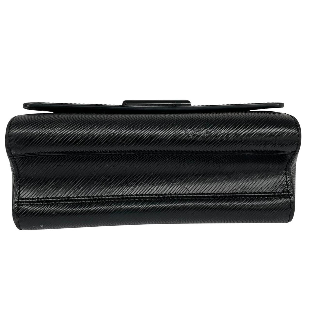Louis Vuitton black Epi leather duffel bag with twist lock and visible wear.
