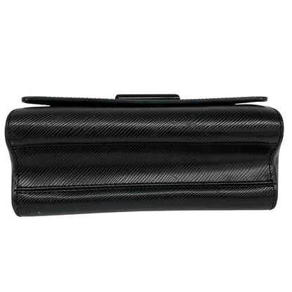 Louis Vuitton black Epi leather duffel bag with twist lock and visible wear.