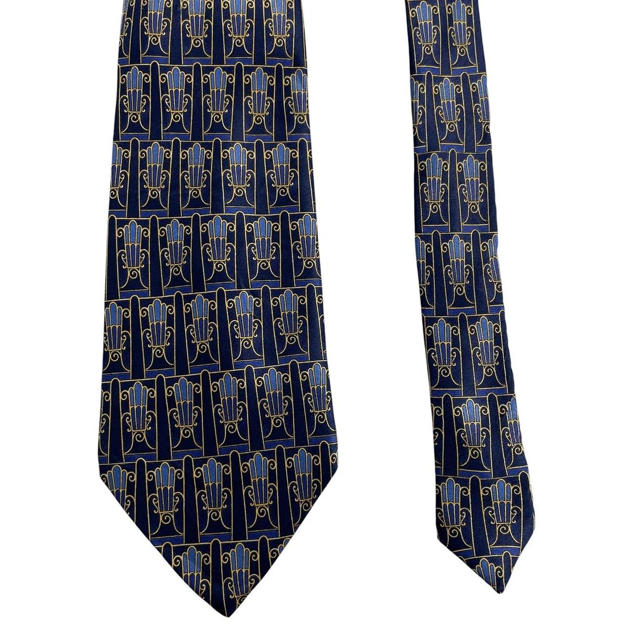 Lanvin silk tie featuring floral geometric print in vibrant colors.