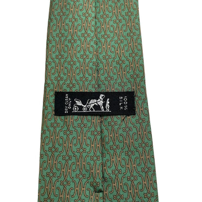 Hermes green silk tie with subtle sheen and logo detailing.