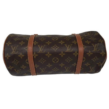Louis Vuitton duffel bag brown and tan monogram canvas with logo pattern and wear.