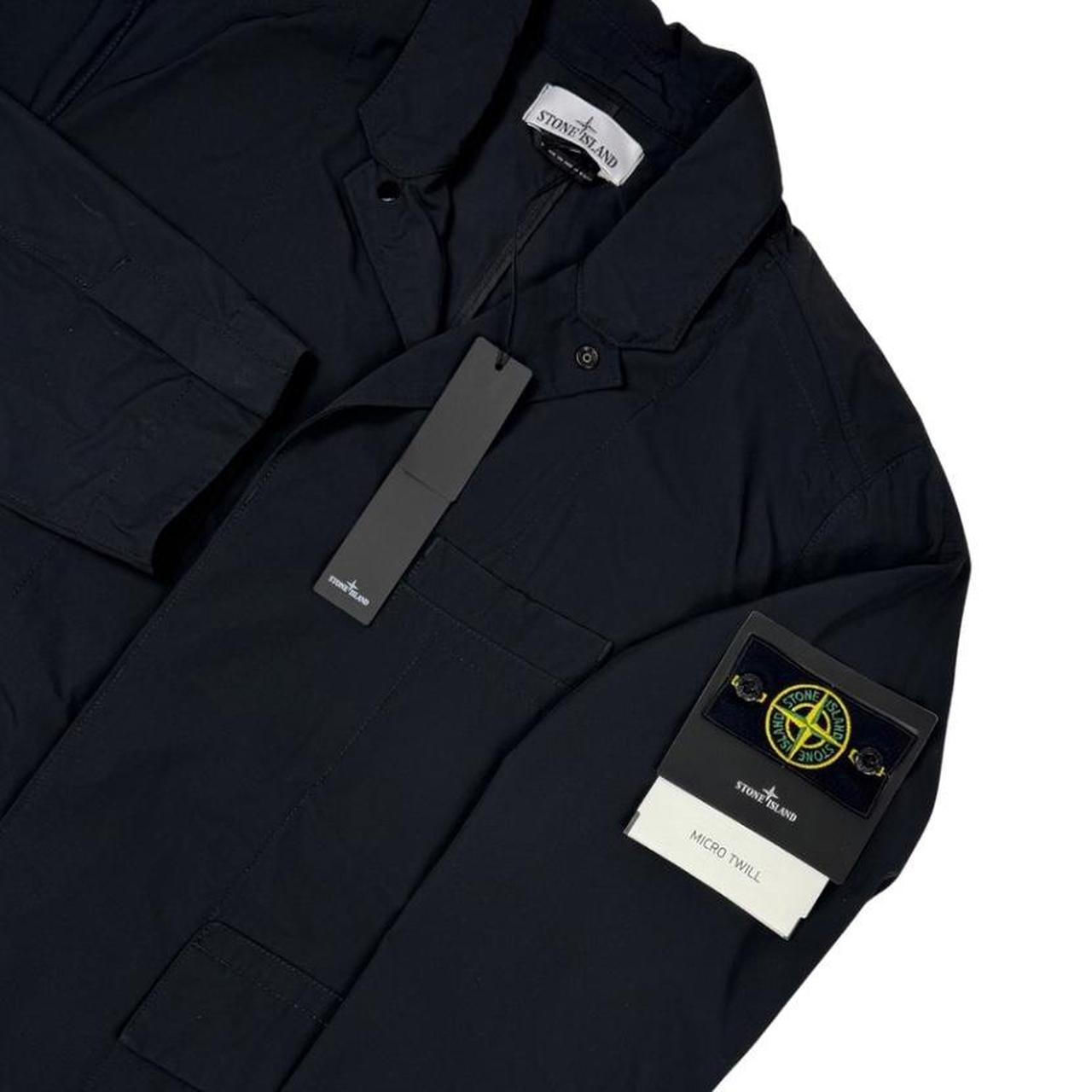 Stone Island black full zip jacket with logo badge and micro twill fabric.
