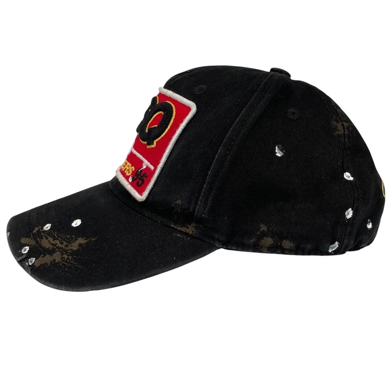 Dsquared2 black and red baseball cap embroidered Brothers logo on front.