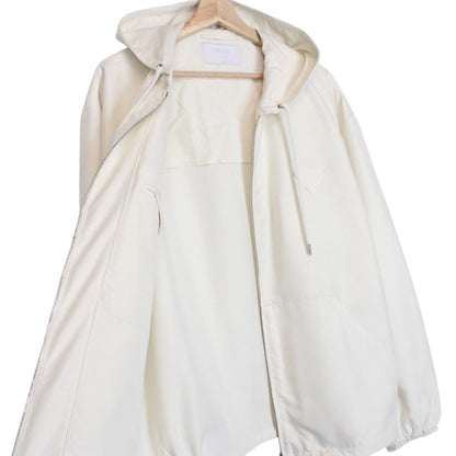 Prada cream silk hooded jacket with triangle logo and full zip detail.