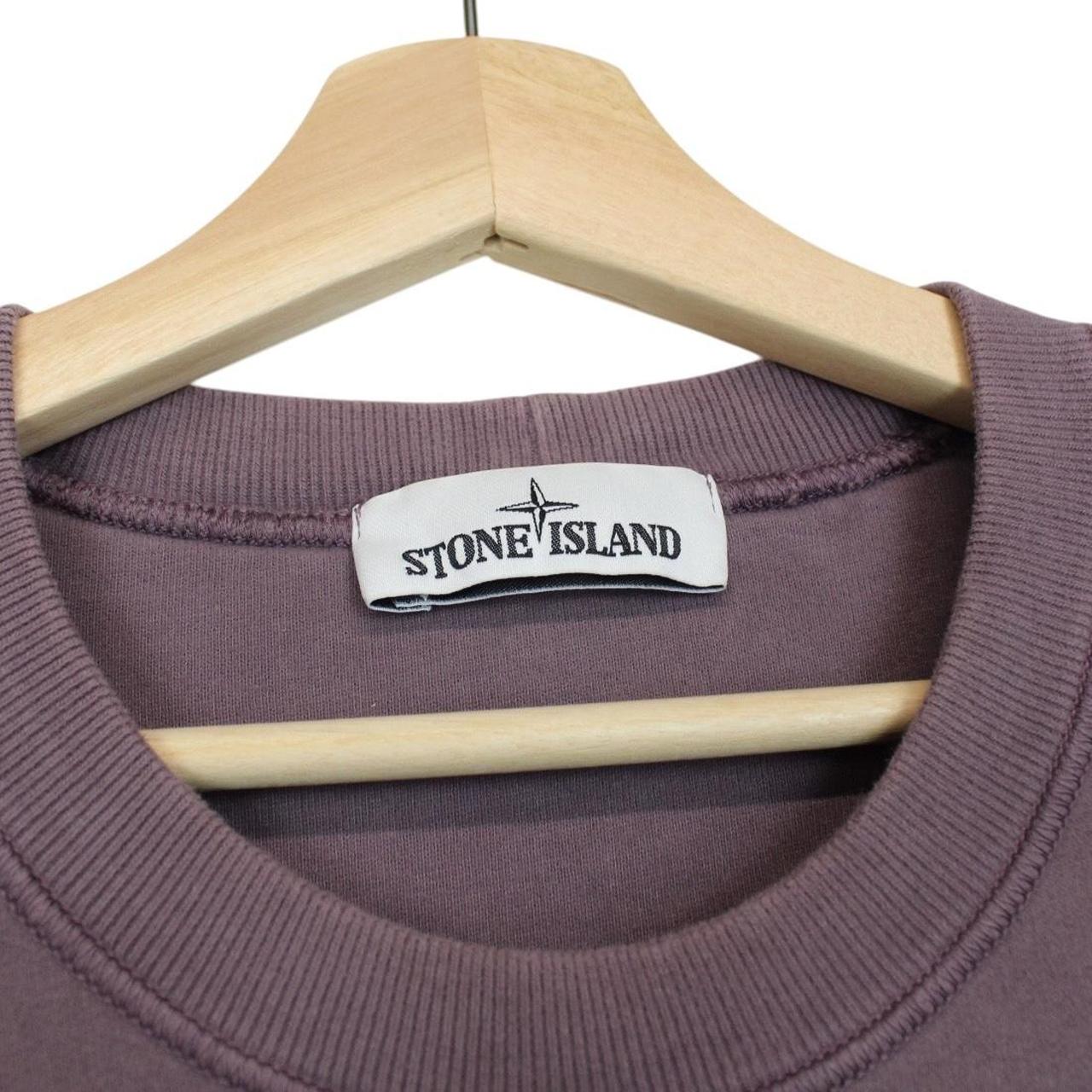 Stone Island mauve pink cotton sweatshirt with iconic compass logo patch.