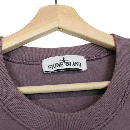 Stone Island mauve pink cotton sweatshirt with iconic compass logo patch.