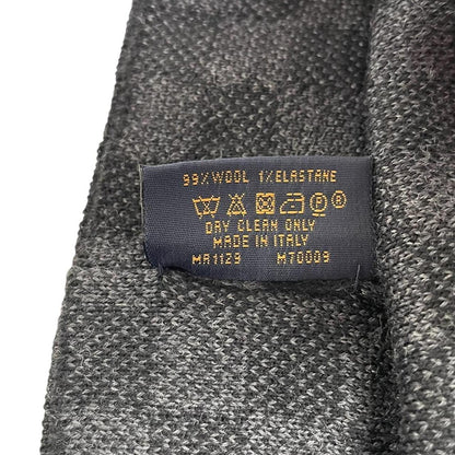 Louis Vuitton black and grey damier wool beanie with logo pattern.