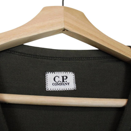 CP Company khaki green sweatshirt with goggle lens detail and cotton material.