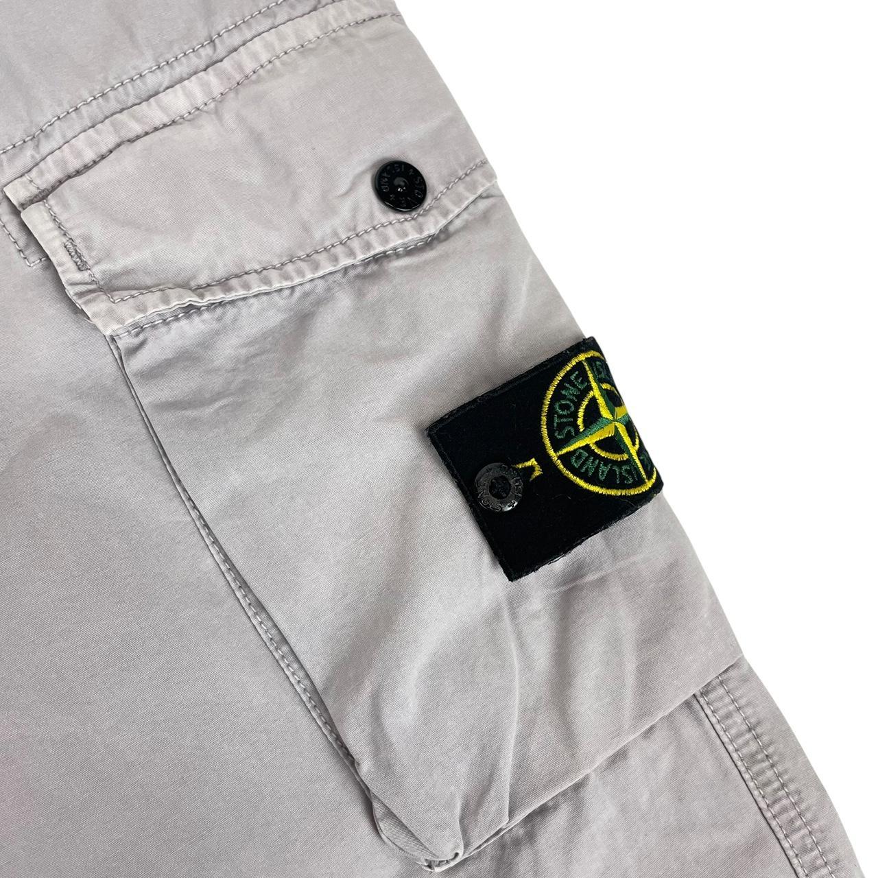 Stone Island grey cargo trousers with logo patch and slim fit design.