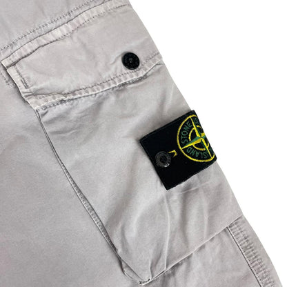 Stone Island grey cargo trousers with logo patch and slim fit design.