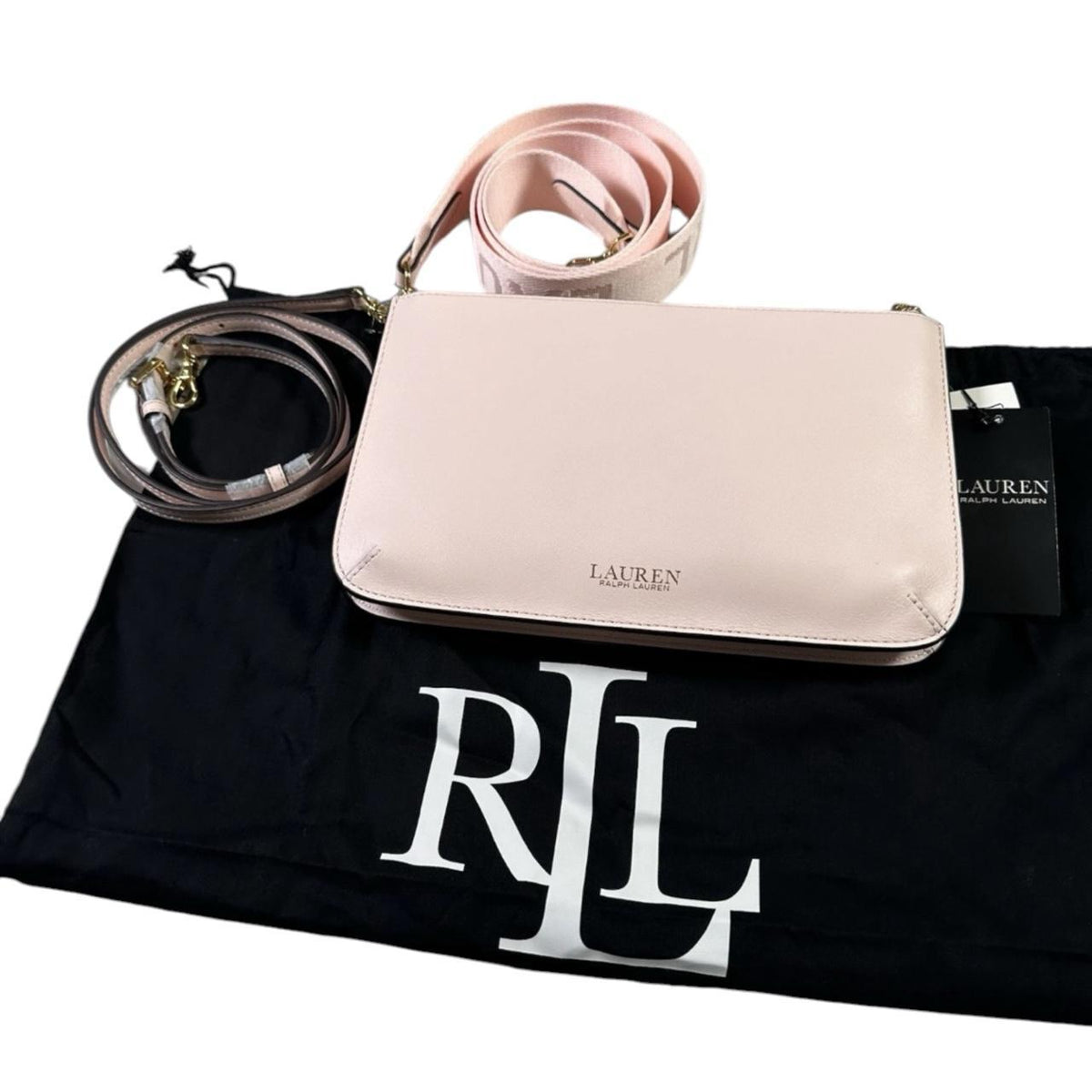 Ralph Lauren pink leather crossbody bag with logo detail and dust bag included.