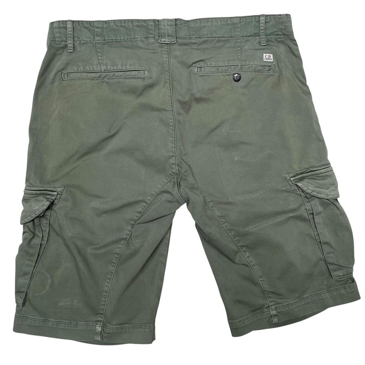 CP Company green cargo shorts with lens detail and cotton material, size XL.