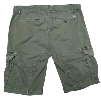 CP Company green cargo shorts with lens detail and cotton material, size XL.