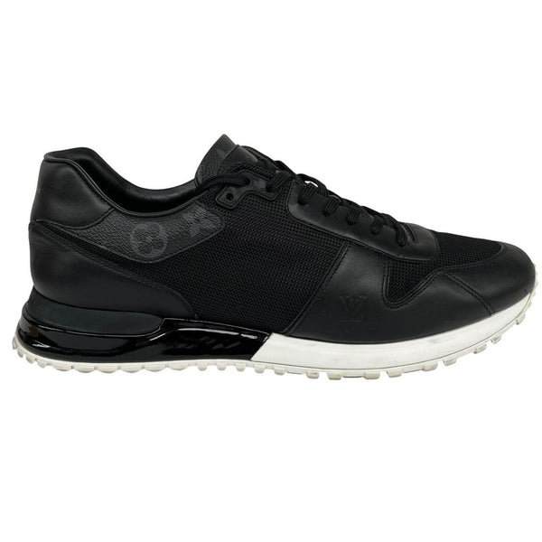 Louis Vuitton black trainers featuring monogram pattern and leather-mesh material.