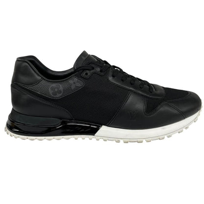 Louis Vuitton black trainers featuring monogram pattern and leather-mesh material.