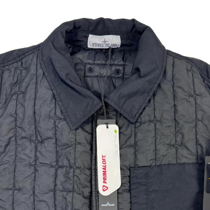 Stone Island black quilted nylon jacket with logo badge and Primaloft-TC material.