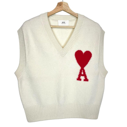 Ami Paris cream and red wool knit sweater vest with heart logo detail.