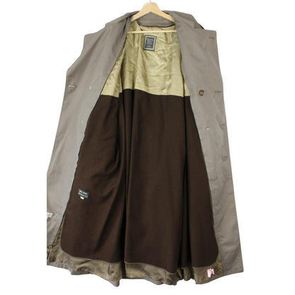 Christian Dior grey double breasted trench coat with removable wool lining and belted waist.