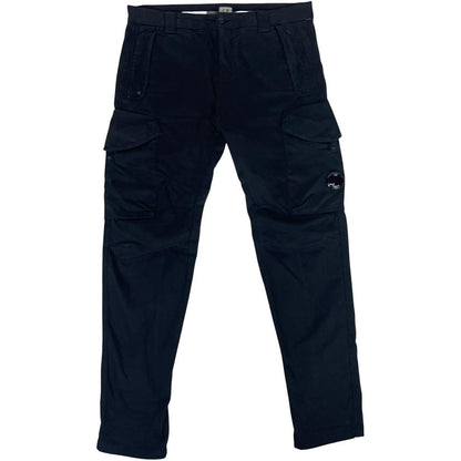 CP Company navy blue tapered fit cargo trousers with lens detail and pockets.
