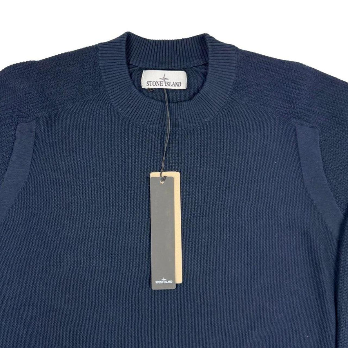 Stone Island navy blue cotton knit jumper with micro stitch detailing and logo patch.