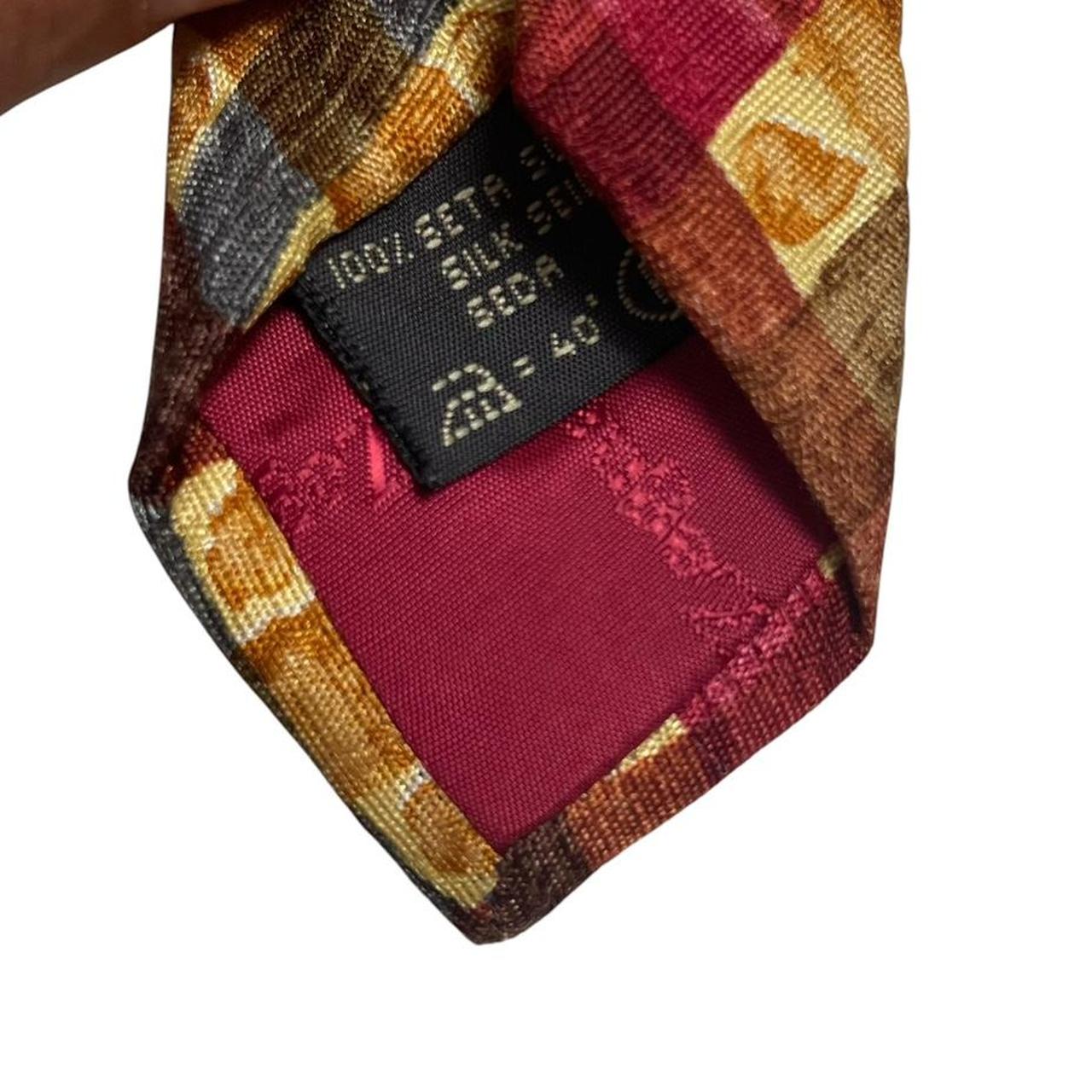 Ermenegildo Zegna multicoloured silk tie with intricate patterns and smooth texture.