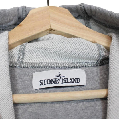 Stone Island grey cotton hoodie with iconic compass logo and drawstring hood.