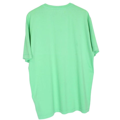 Stone Island green short sleeve cotton t-shirt with compass logo and tag detail.