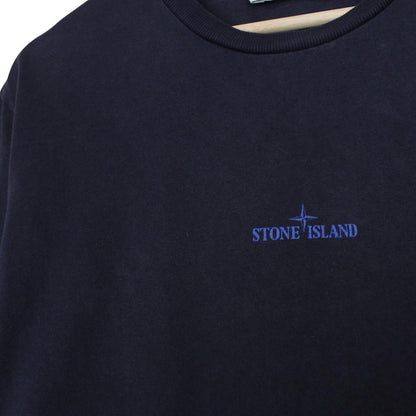 Stone Island navy blue short sleeve cotton t-shirt with logo print and label detail.