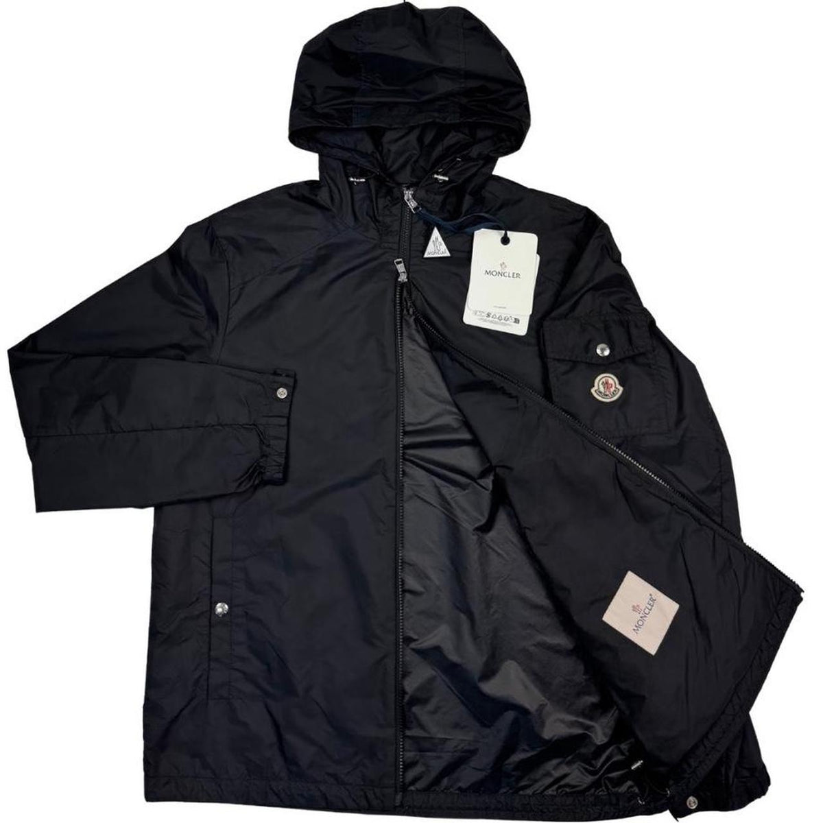 Moncler black windbreaker jacket, full zip, hooded, nylon material, logo on chest.